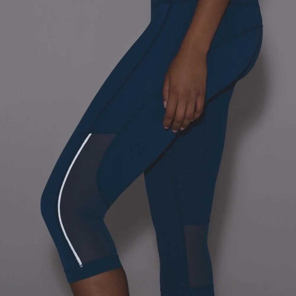 Lululemon size 2 Gear up blue Poseidon cropped leggings with sheer accents
